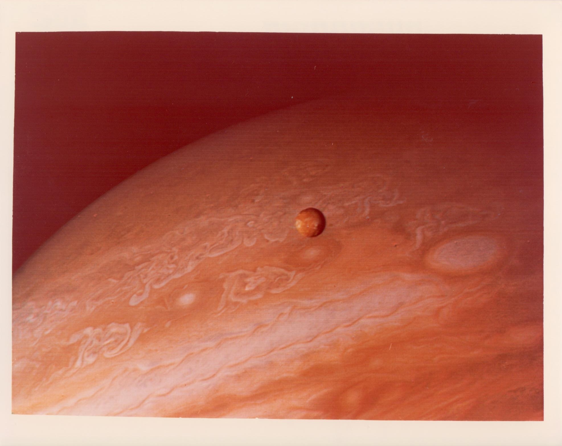 Jupiter and its satellite Io, Voyager 2, June 1979